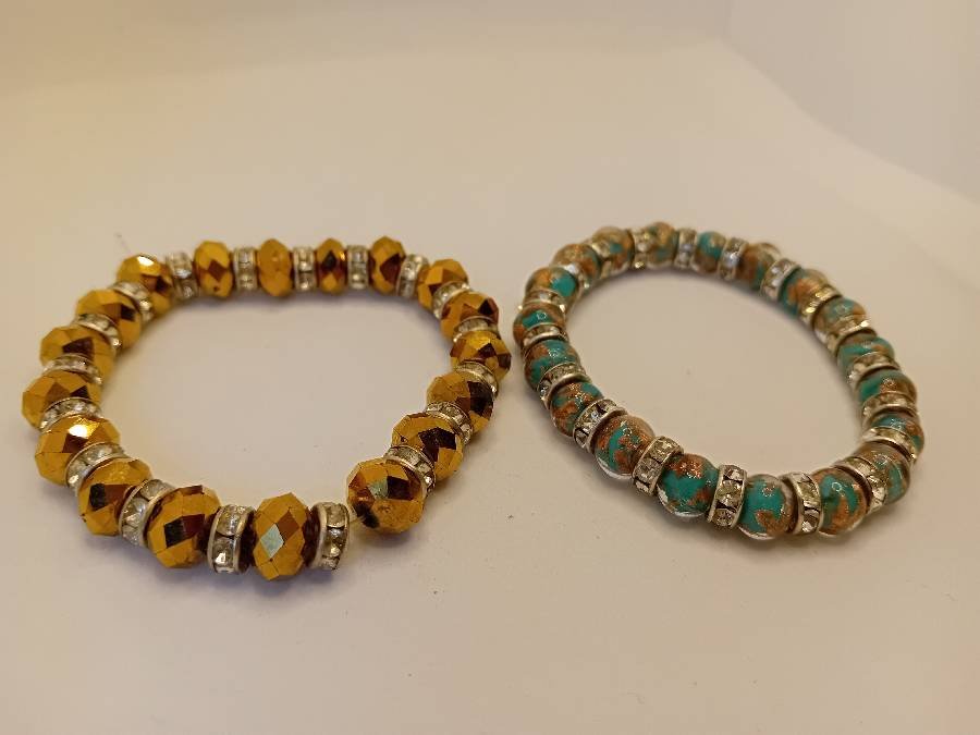 اساور-خرز-تركواز-وذهبي-عدد-٢